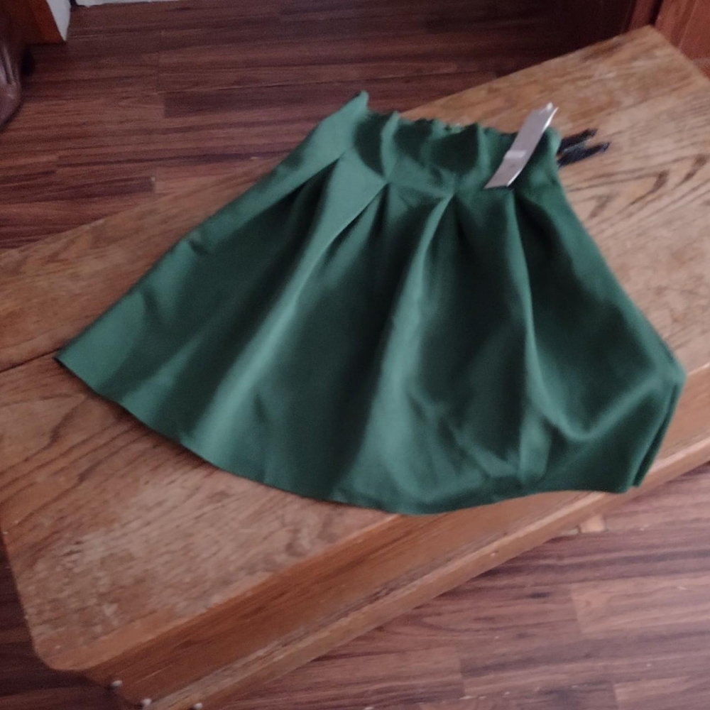 Solid emerald pleated A line mid to high waisted skirt Warm stretch material